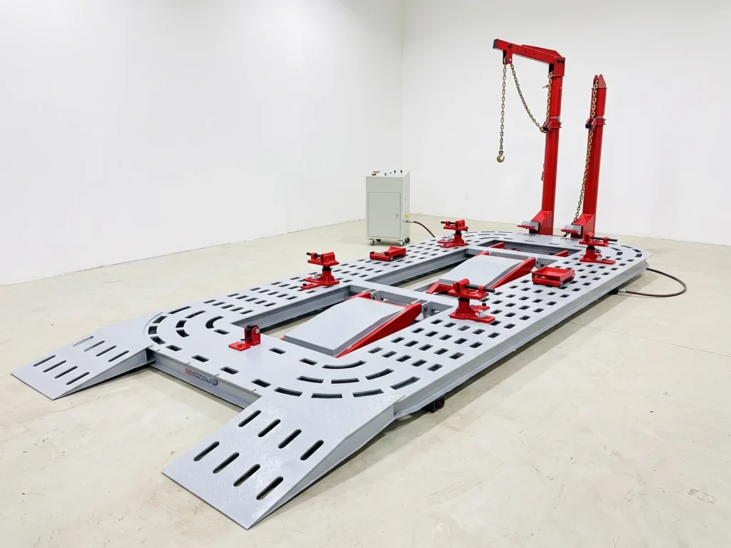 INTECH CR 900 chassis puller in a body repair workshop