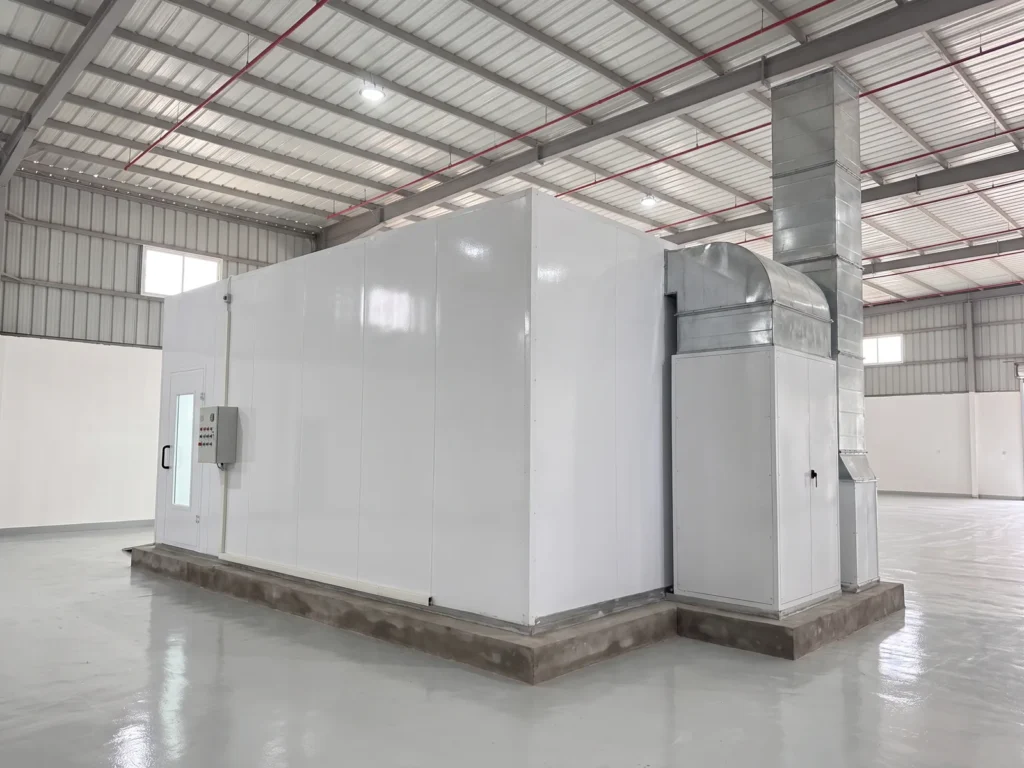 INTECH X300 paint booth, wide view inside the workshop