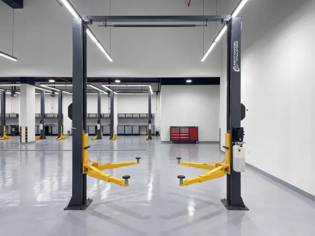 Clear-floor two-post lift 3700 mm, wide view inside the workshop